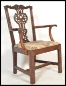 An 18th / early 19th century Chippendale carver desk / office chair having well proportioned and