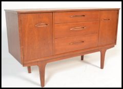 A vintage retro 20th Century Danish influenced teak wood sideboard / credenza of small