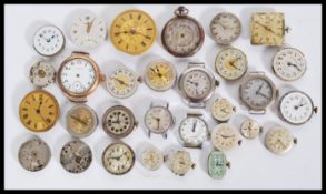 A collection of wrist watch movements of various sizes and styles, most being swiss made including
