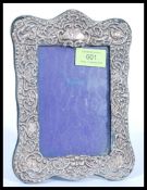 An early 20th century hallmarked silver easel back picture frame bearing Chester hallmarks and