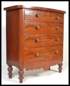 A Victorian 19th century bow front mahogany chest of drawers. Raised on turned legs with 2 short