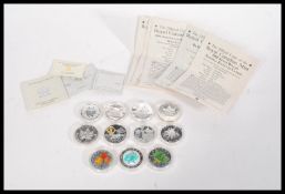A collection of eleven Royal Canadian mint silver proof coins to include five fine silver .999 in