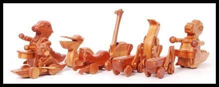 ASSORTED CHESTER WEDGEWOOD'S HANDMADE WOODEN ANIMALS