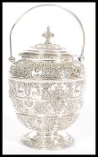 An early 20th century silver plated biscuit barrel by James Dixon and Sons raised on circular base