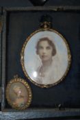 An early 20th Century hand painted watercolour portrait painting miniature depicting a lady in