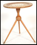 A 20th Century Anglo - Indian colonial inlaid wooden table having inlaid geometric patterning of