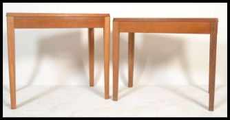 A pair of mid century Air Ministry marked office desks - writing tables in golden oak being raised