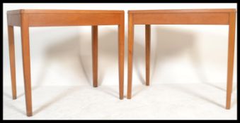 A pair of mid century Air Ministry marked office desks - writing tables in golden oak being raised