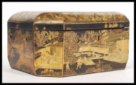 An early 19th Century Canton Chinese export black lacquer work box of cushioned octagonal form