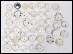 A good selection of pocket watch faces, most being white enamelled, some with subsidiary dials, some