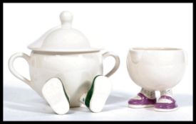 A vintage retro 20th Century Carlton Ware Walking Ware ceramic sugar bowl and matching milk