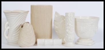A selection of SylvaC ceramic vases / vessels to include a beige reeded vase no. 3255, a white