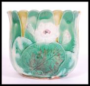 A 19th century Victorian majolica planter in the manner of George Jones having blue glaze interior