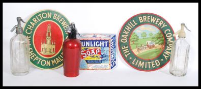 A group of Breweriana related advertising items to include three soda siphons one for Brooke and