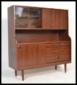 A vintage retro 20th century faux rosewood veneered highboard sideboard display cabinet by Greaves