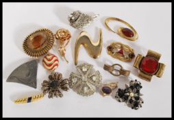 A collection of Vintage brooches to include singed Original by Robert, Les Barnard, Freirich, Art,