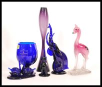 A selection of Bristol blue glass ornaments to include a large blue glass goblet marked for the