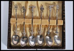 A set of six early 20th Century Italian silver coffee / tea spoons having figural handles comprising
