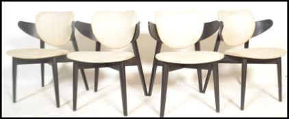 A set of four contemporary dining chairs designed by Stolar Gottfrid for Ikea, the ebonised