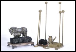 Two equestrian related cast iron items, comprising of a Horse Head boot holder - with wooden balls