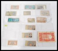 A collection of international bank notes to include Francs, Lire, Rupee, Cyprian Shillings, a 1943