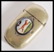 A silver plated vesta match case of hunting interest having an enamel cartouche depicting a