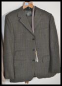 A vintage mid 20th Century Dunn and Co gentleman's tweed / check two piece suit in fantastic