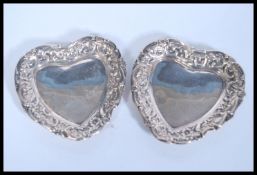 A pair of 19th Century Victorian silver hallmarked peanut / trinket dishes of heart shape having