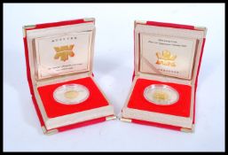 A 2000 Lunar Canadian Silver Proof 925 $15 Coin together with a 2001 Lunar Canadian Silver Proof 925