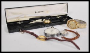 A collection of vintage watches to include a Avia yellow metal wrist watch having baton markings
