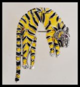 A sterling silver plique a jour brooch in the form of a tiger with marcasite face and ruby eyes.