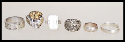 A group of sterling silver 925 to include a lion head ring with citrine stone mane, marcasite
