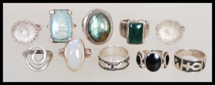 A group of ten sterling silver rings to include a large labradorite example, blue stone with