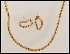 A fantastic 9ct gold rope twist necklace and earring demi parure set bearings hallmarks and being
