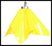 A mid century retro original handkerchief ceiling lamp light having the original vibrant yellow