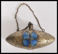 An early 2oth Century Chinese silver plated drinks flask of ovoid shape having lapis lazuli inlay.
