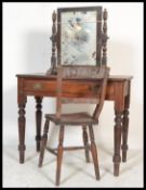 A 19th Century Victorian mahogany writing table / desk having a flared top over single drawer raised
