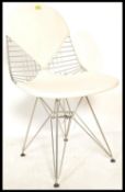 After Charles and Ray Eames for Vitra ' Wire ' / ' DKR ' dining chair. The wirework back with