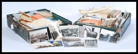 A large collection of approx 1000 vintage postcards dating from the early 20th Century to include