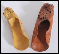 Two 20th Century Chinese tea powder scoops / caddy spoons, carved from fruitwood the first carved
