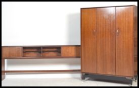 Ernst  Gomme for G Plan Tola wood triple door / bi fold door wardrobe in the Librenza pattern,