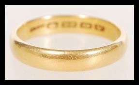 A 22ct gold band ring, hallmarked Birmingham date letter V, weight 7.2g, size W.5.