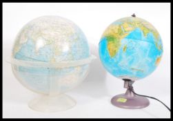 Two vintage globes to include a 1960's National Geographic globe set to clear plastic stand and