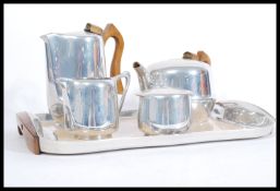 A good vintage retro 20th century iconic Piquet ware tea service consisting of teapot, water pot,