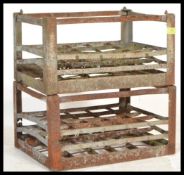 A group of vintage retro 20th Century Industrial milk bottle crates of metal construction having