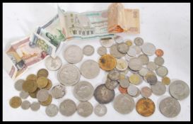 A collection of coins to include an 1895 Victorian crown, a George V Shilling, a 1965 Churchill