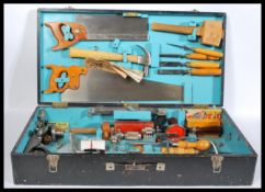 A vintage mid 20th Century ebonised wood working work box, the hinged lid opening to reveal a