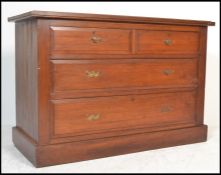 An early 20th century Edwardian mahogany cottage chest of drawers. The bank of two over three