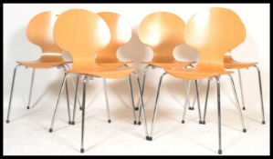 A set of six vintage Bistro chairs of beech veneer plywood construction raised on chrome legs. In