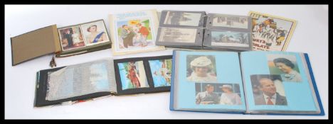 Postcards; a collection of four assorted postcard albums dating from the early 20th Century. Various